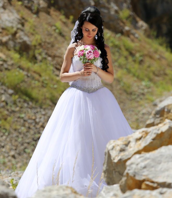 Two women standing together in a hallway